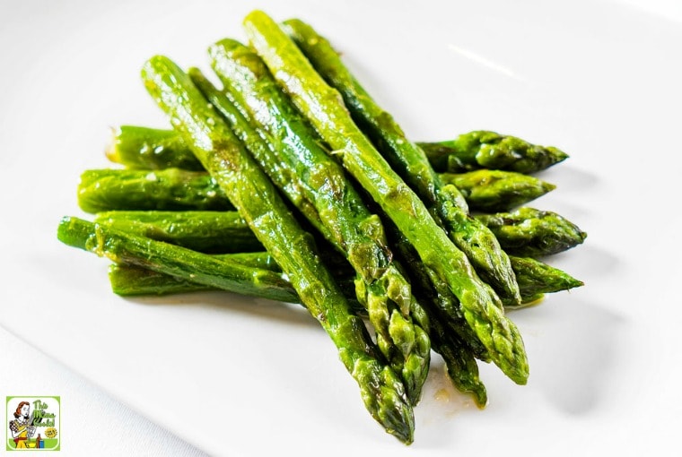 A plate of Marinated Asparagus.