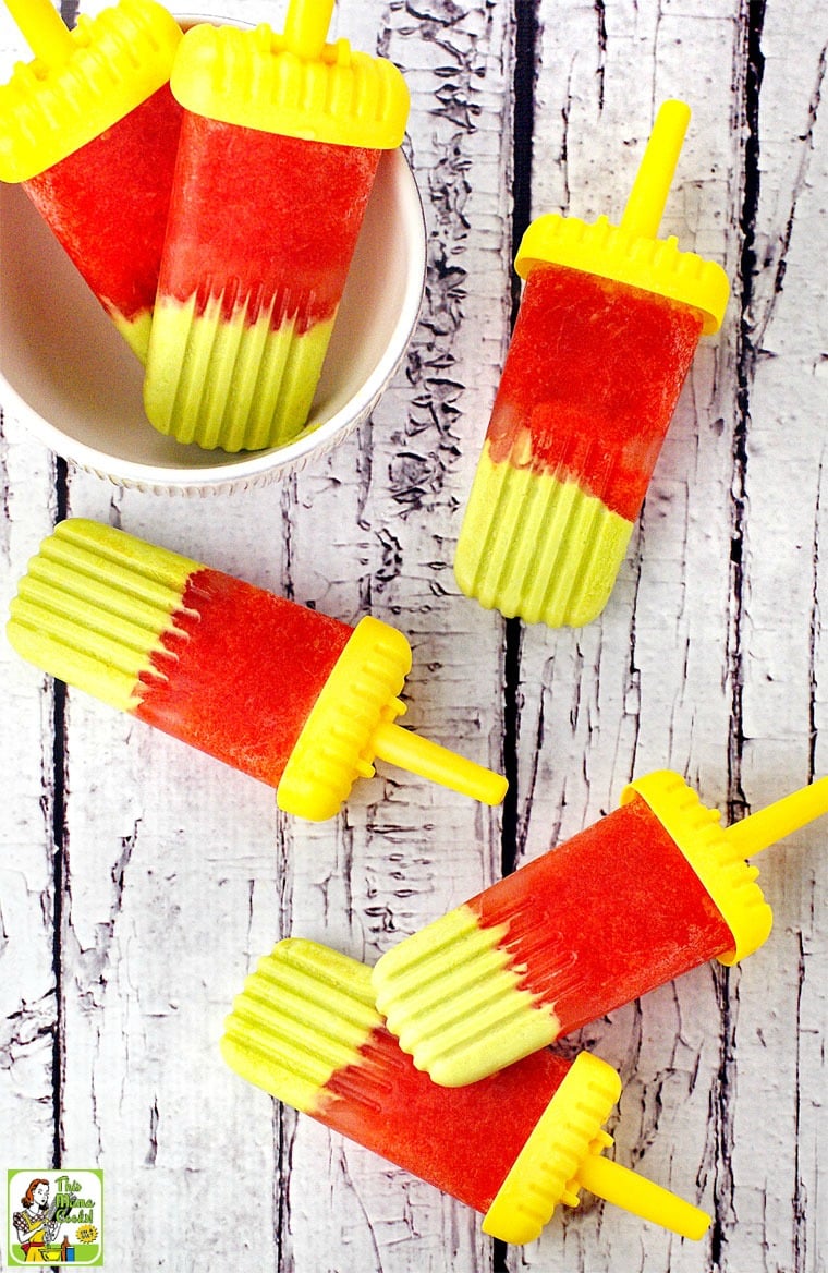 Avocado & Watermelon Ice Pops in a white bowl and on a white wood tabletop.