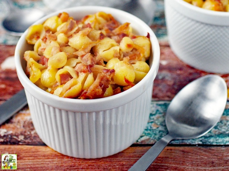 A bowl of Gluten Free Mac & Cheese Casserole with spoons.