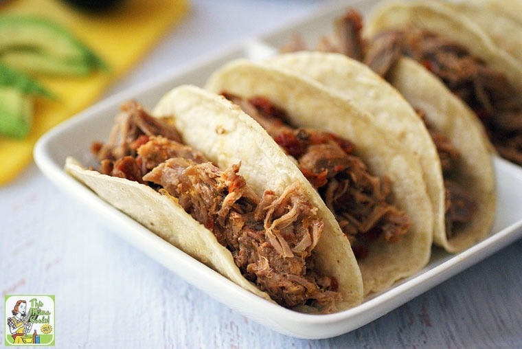 A platter of slow cooker pulled pork tacos.