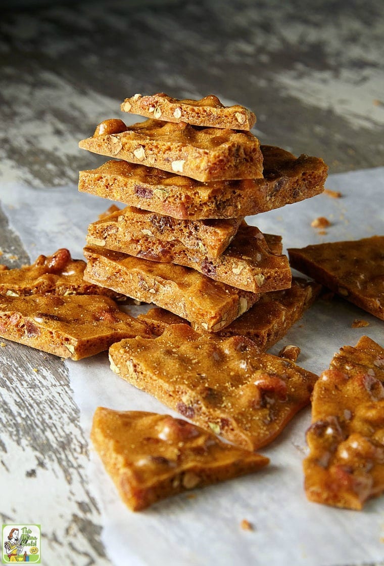 A close up of a pile of microwave nut brittle.