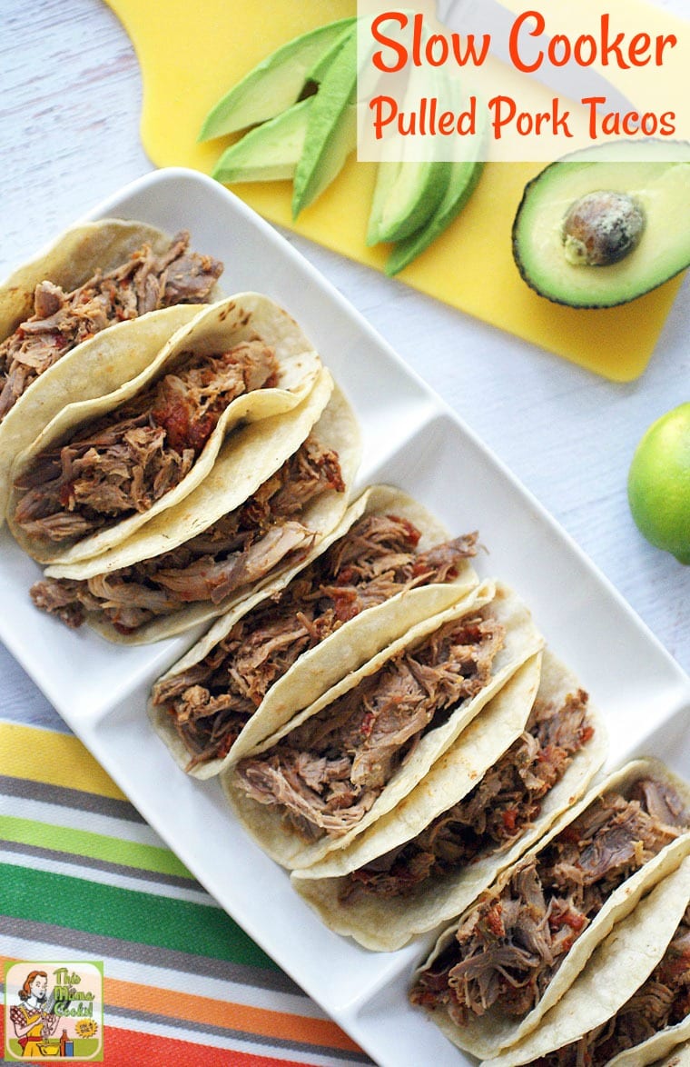 A platter of Slow Cooker Pulled Pork Tacos with avocados.