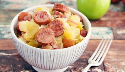 Are you looking for a gluten free Crock-Pot recipe? This Slow Cooker Sauerkraut and Sausage with Apples and Potatoes takes only 15 minutes to prepare! Makes a great party or potluck recipe, too.