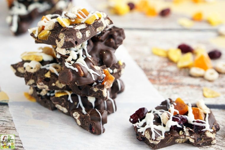 A stack of  Chocolate Bark Candy on parchment paper.