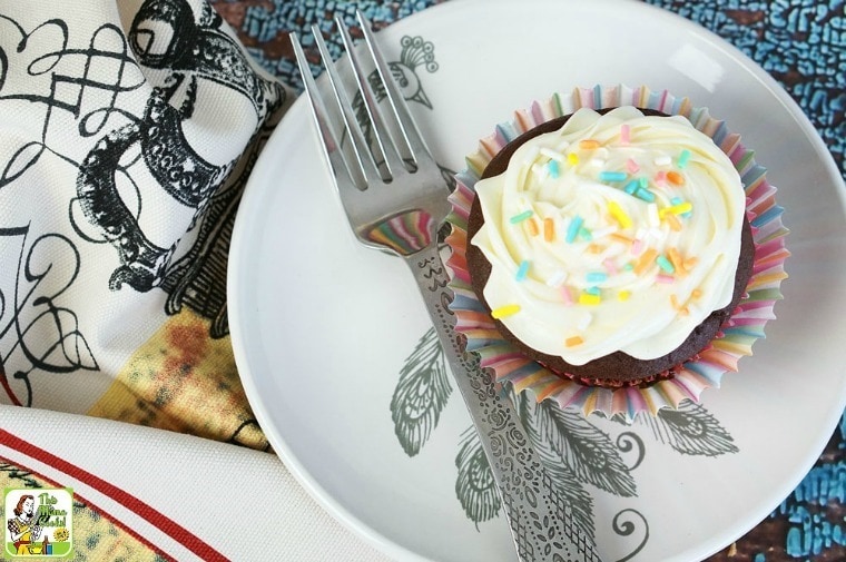 Cookie Dough Stuffed Cupcake on a plate with a fork.