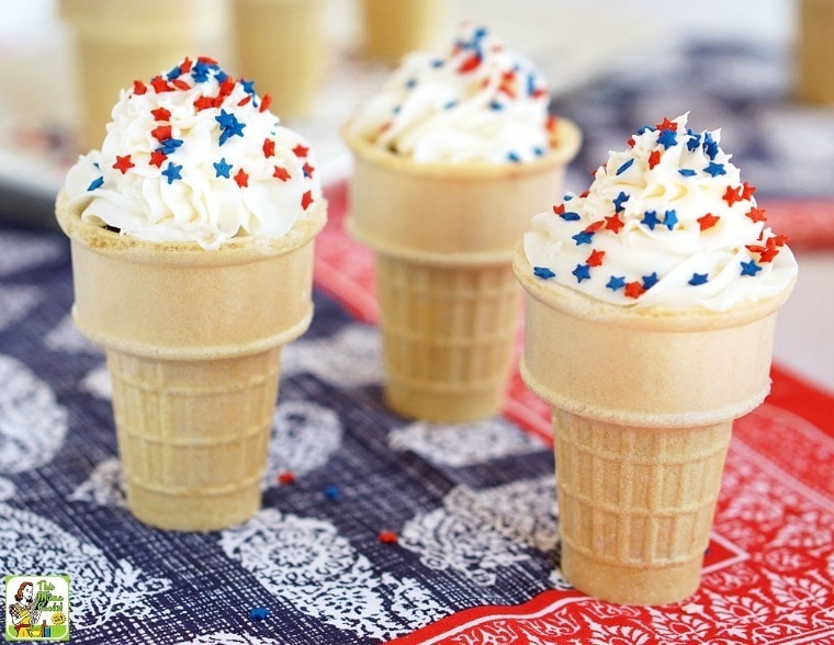 Three Ice Cream Cones Cupcakes on a red, white and blue napkin.
