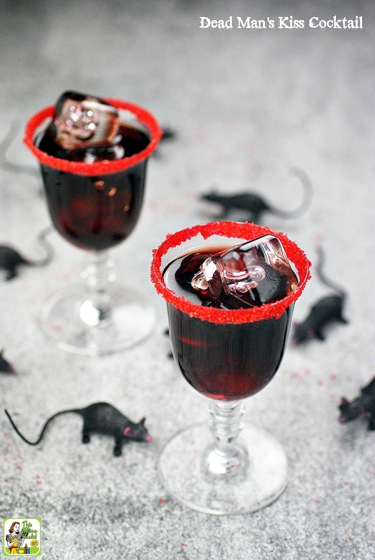 Black cocktails with red sugar rims for Halloween.