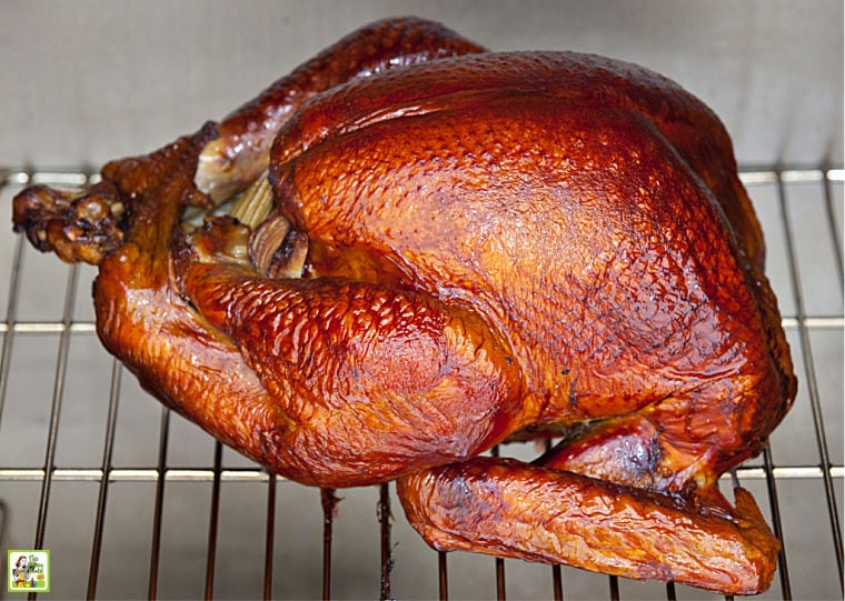 Smoked turkey on a rack in an electric smoker.