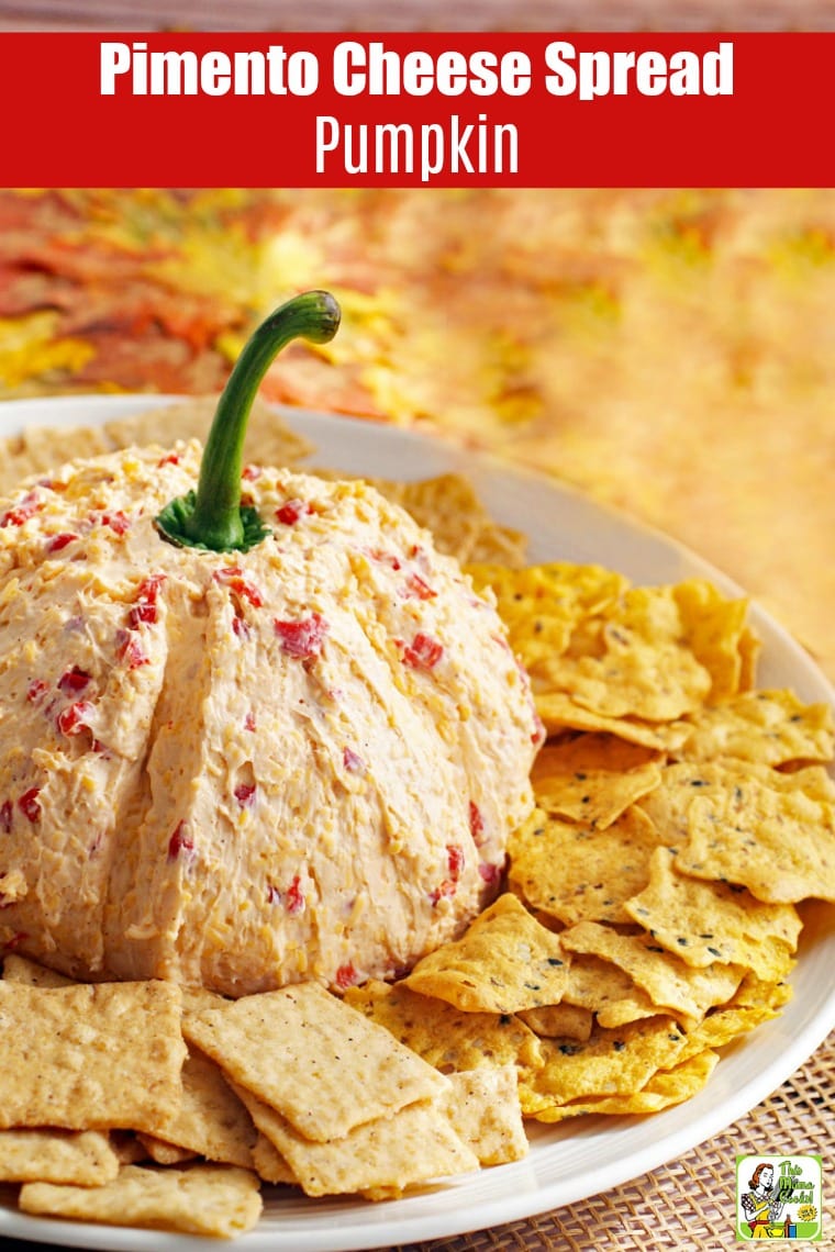 Pimento Cheese Spread Pumpkin with crackers on a plate.