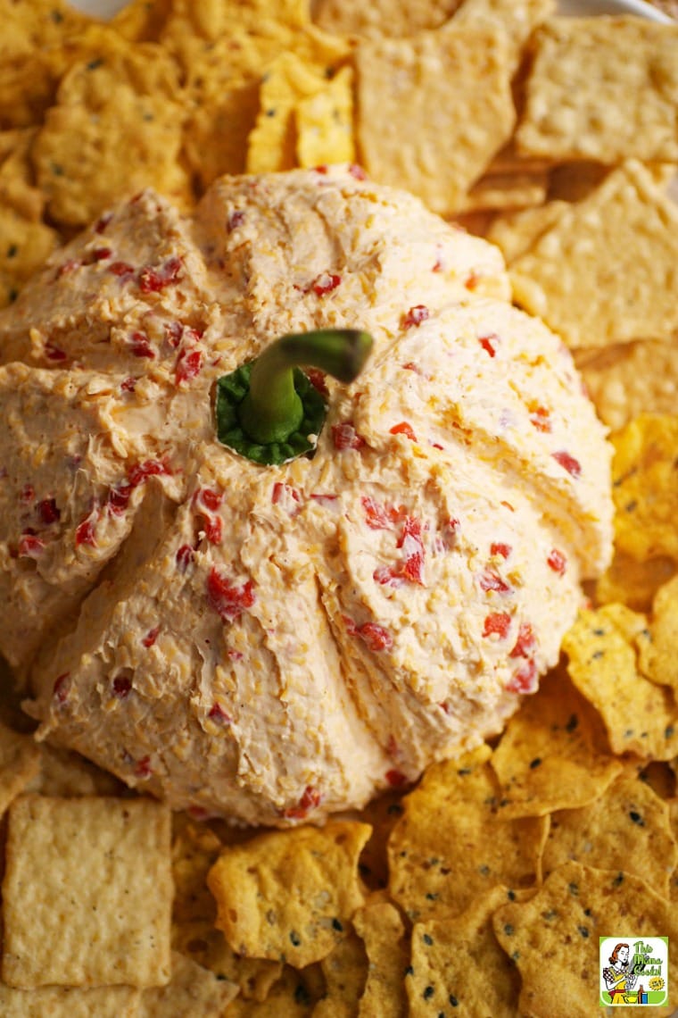 Closeup of a Pimento Cheese Pumpkin with crackers.