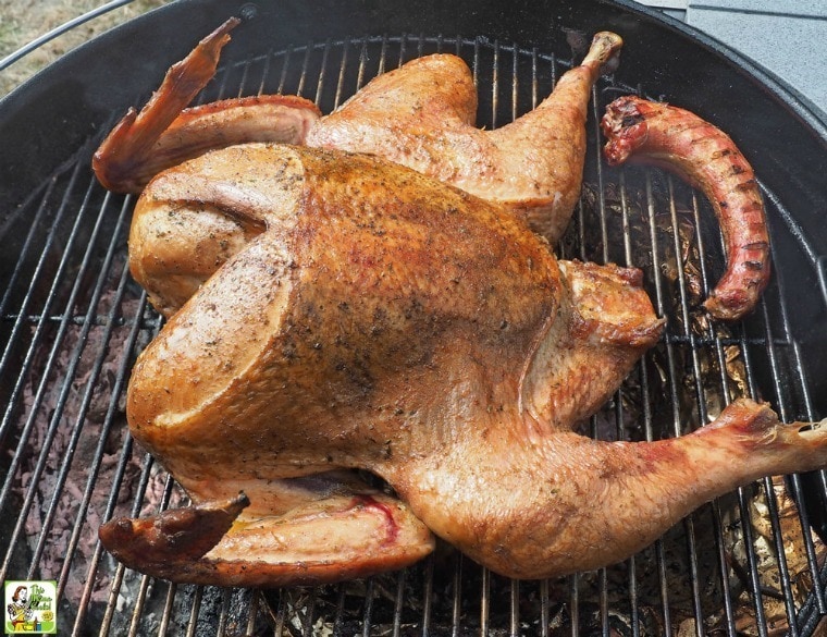 A spatchcock or butterflied turkey on a grill.