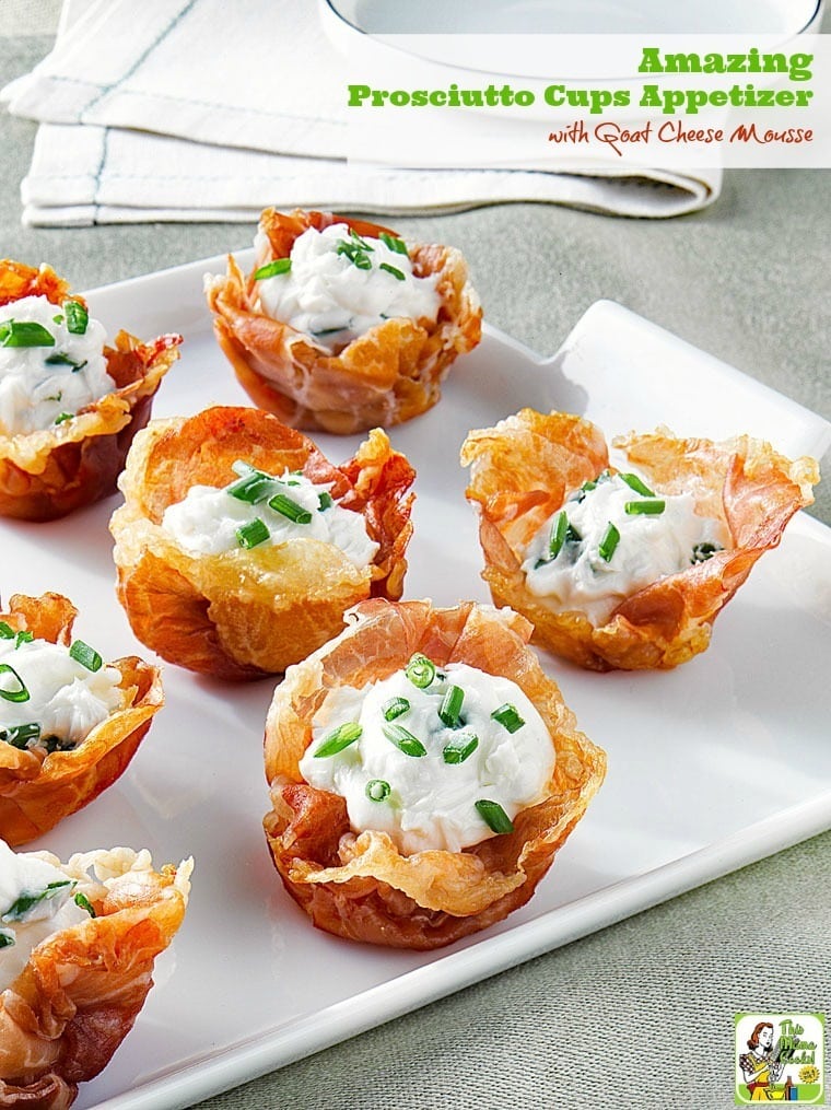 Closeup of Prosciutto Cups with Goat Cheese Mousse on a white plate.