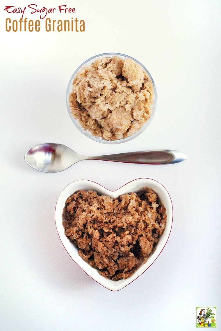 Glass round bowl and a ceramic heart shaped bowl of coffee granita with a silver spoon.