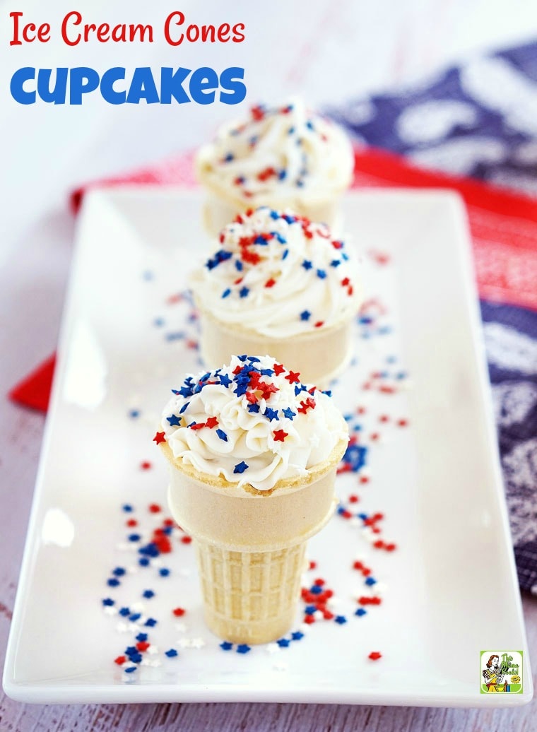 Ice Cream Cones Cupcakes with red white and blue sprinkles on a white plate.