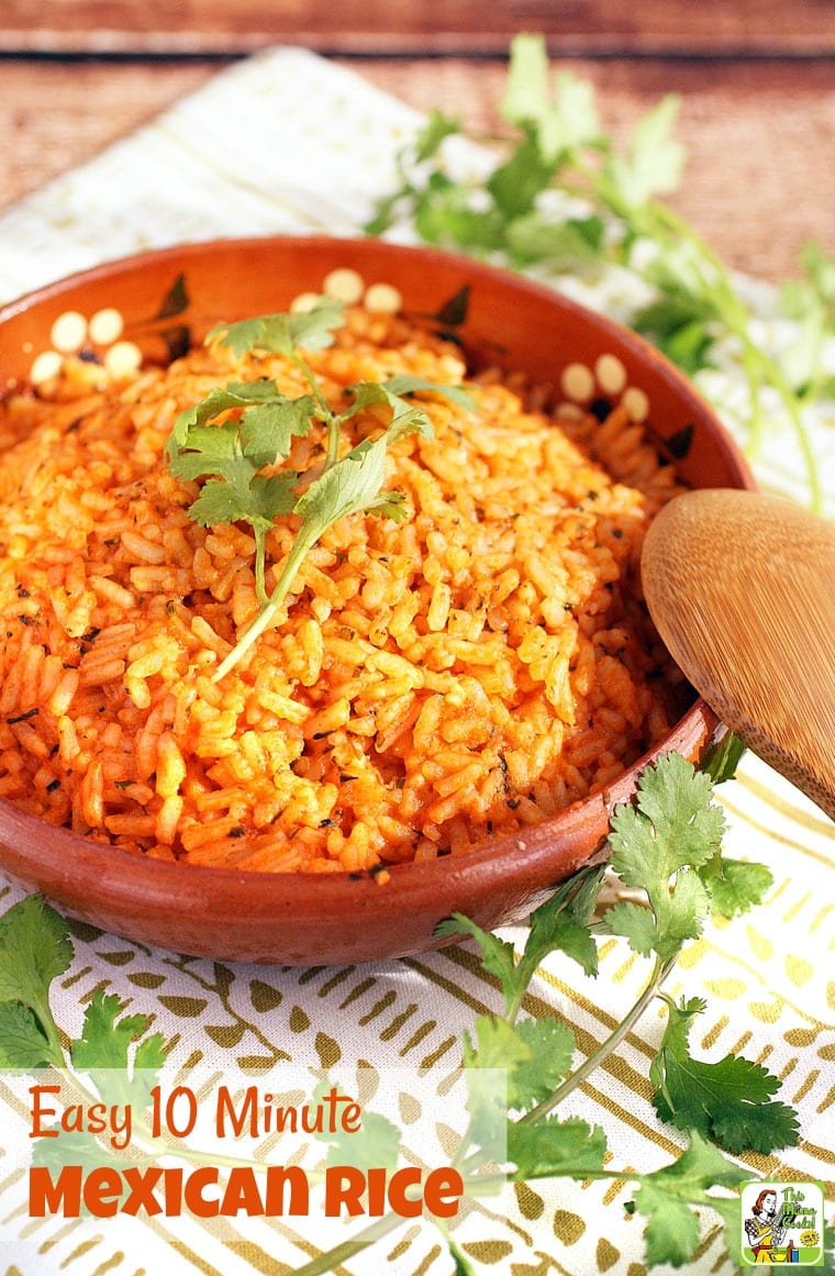A bowl of quick Mexican rice with cilantro and wooden serving spoon.