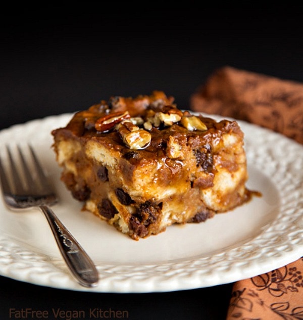 A slice of Vegan Pumpkin Bread Pudding on a plate with a fork.