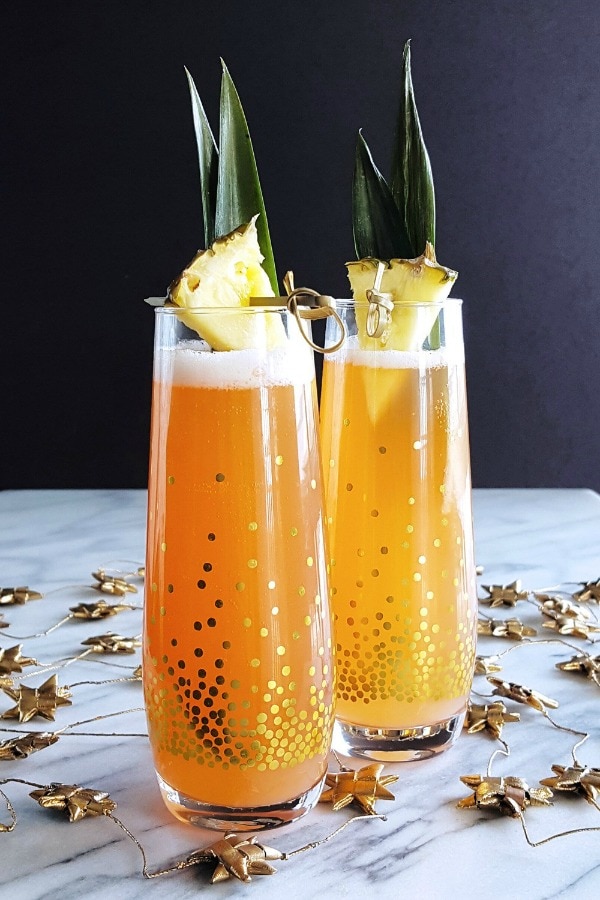 Flutes of Ginger Jungle Bird Sparkling Cocktails.