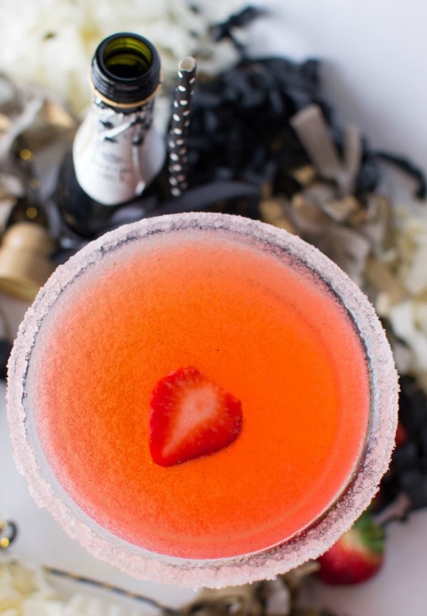 Overhead view of a glass of Sparkling Strawberry Martini.