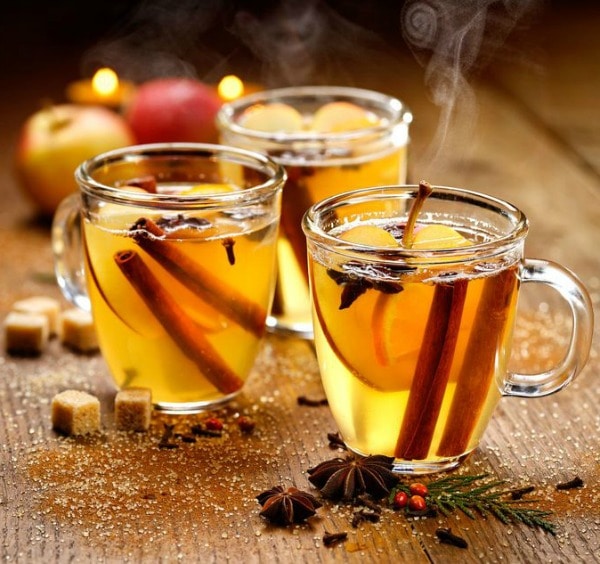 Glass mugs of Mulled Apple Cider.