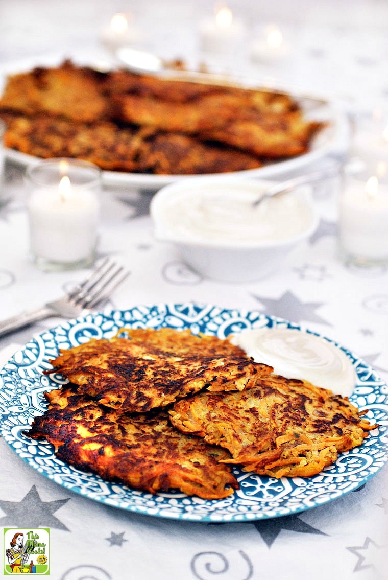 A plate of Sweet Potato Pancakes with Greek yogurt.