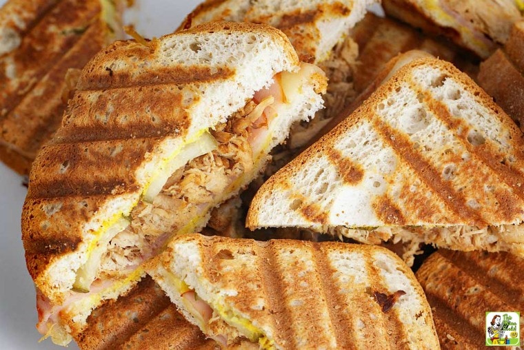 A pile of Easy Cuban Panini sandwiches.