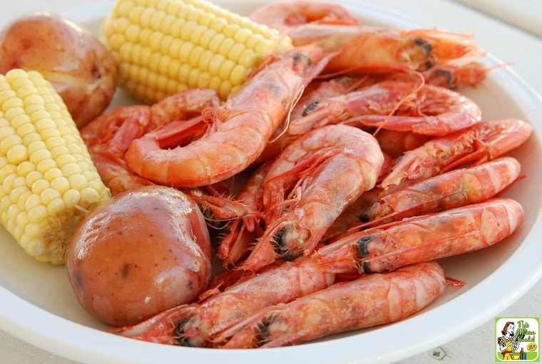 A plate of shrimp, corn, potatoes of Cajun seafood boil.