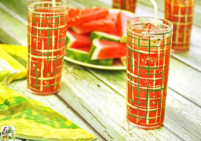 Glasses of watermelon cocktails with a green napkin. 