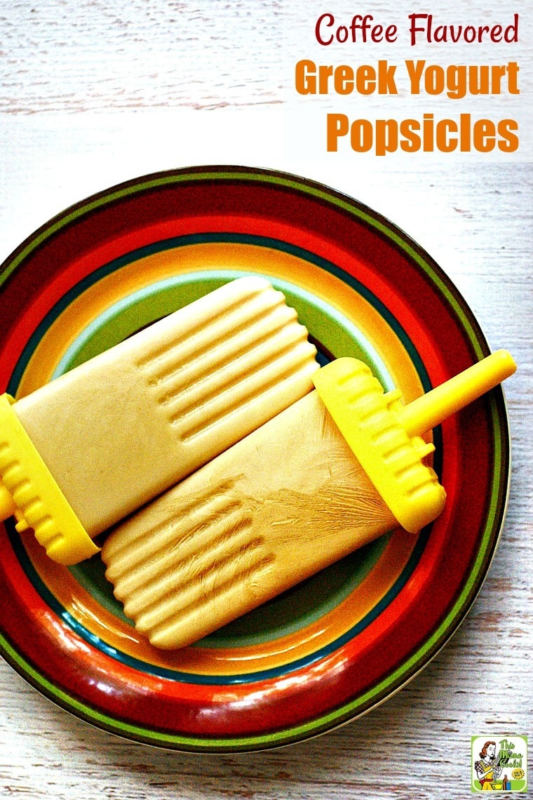 Two Yogurt Popsicles on a striped plate.