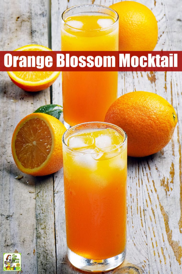 Glasses of Orange Blossom Mocktail and cut and whole oranges