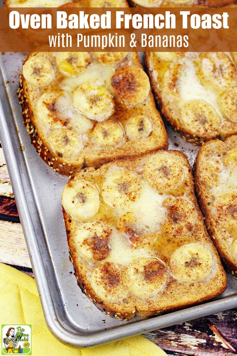 Closeup of baked French toast with slices of bananas, syrup, and melted butter on a baking sheet.