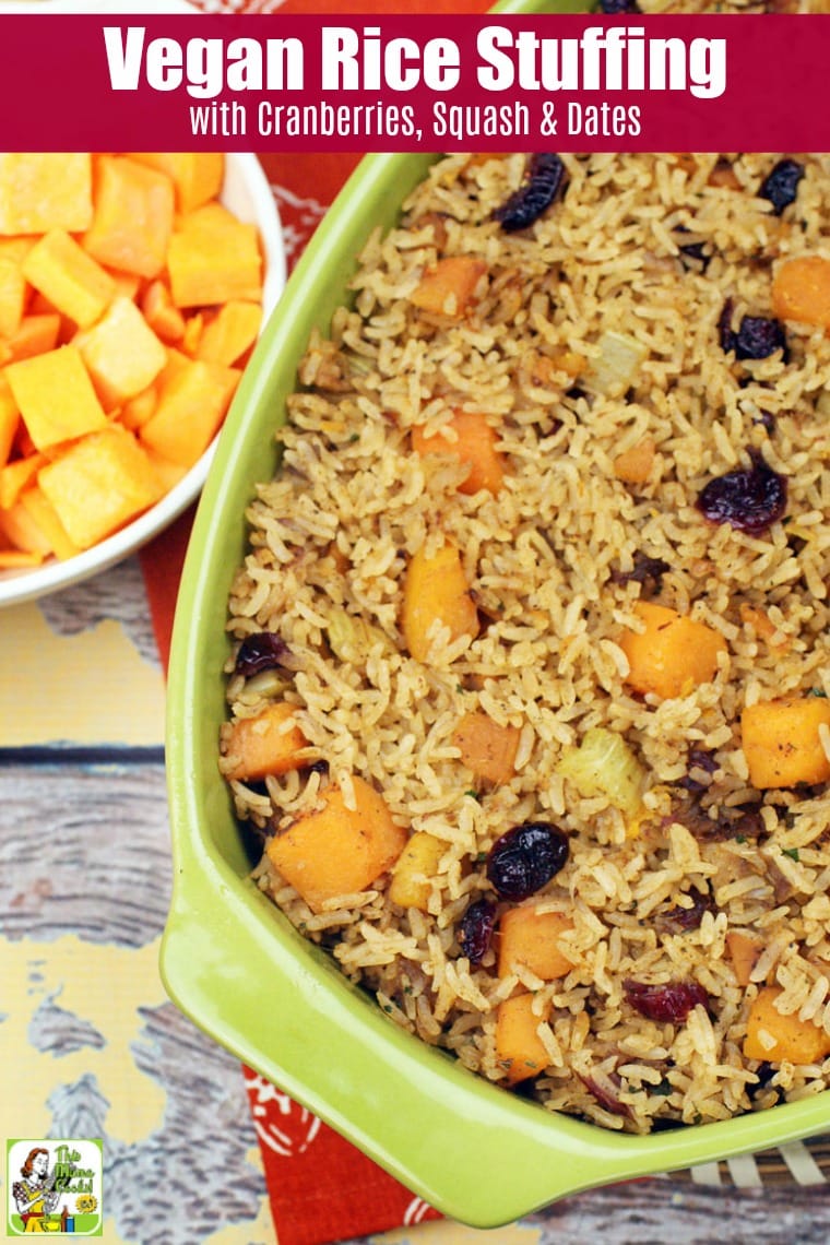 A casserole dish of rice stuffing with cranberries, squash and dates.