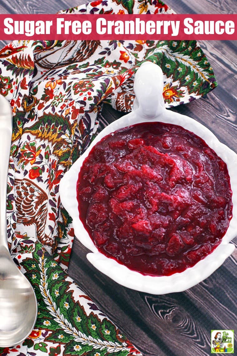 Overhead shot of a white turkey shaped bowl of Cranberry Sauce and a colorful napkin.