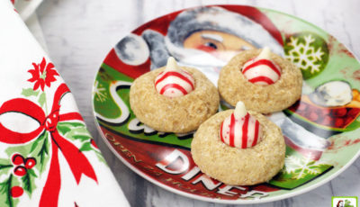 A Christmas plate of Peppermint Thumbprint Hershey Kiss Cookies