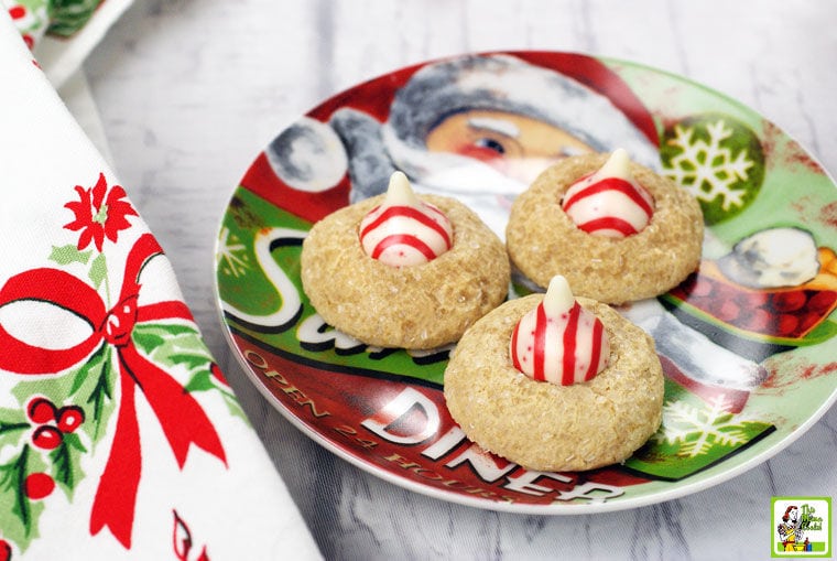 A Christmas plate of peppermint gluten free thumbprint cookies.