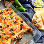 Layered Taco Dip Recipe with Ground Beef and Cream Cheese