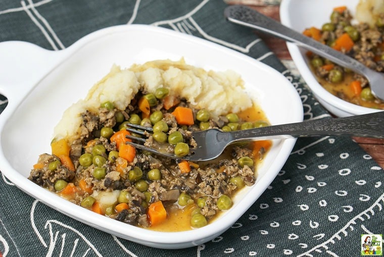 A plate of ground turkey shepherd's pie with a fork.