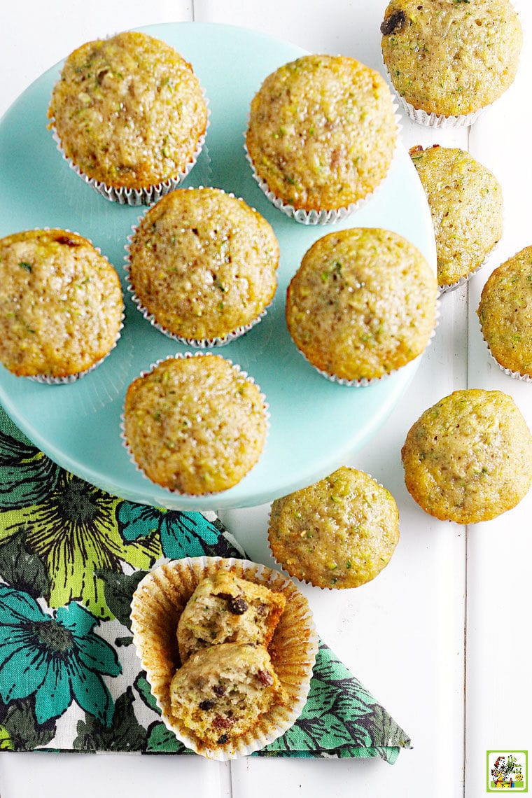 Overhead shot of gluten free muffins on a cake stand with napkin.