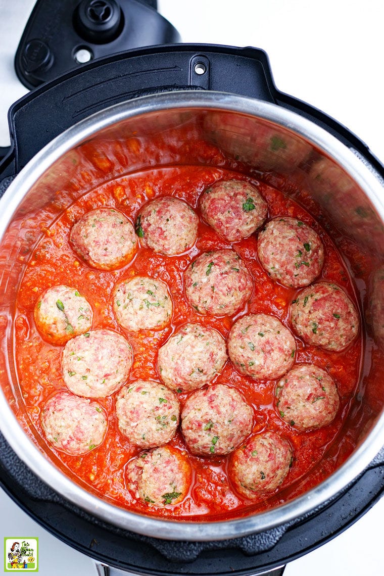 Meatballs in sauce in an Instant Pot pressure cooker.