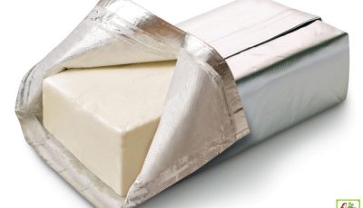 Block of opened cream cheese.