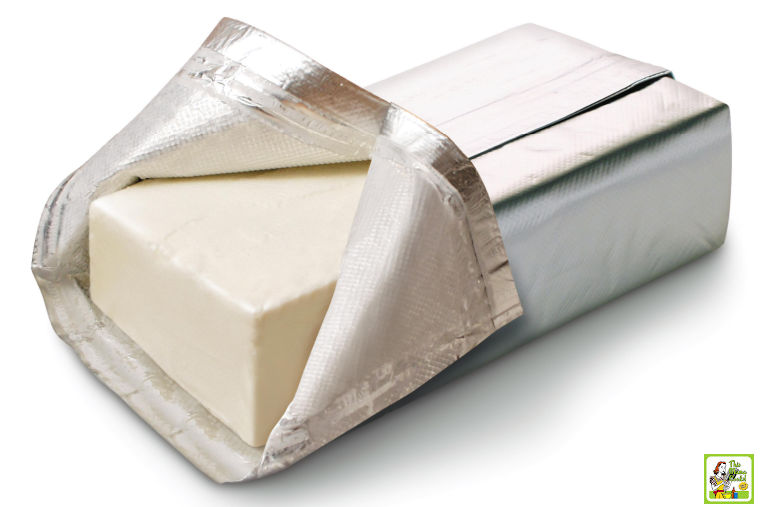Block of opened cream cheese.